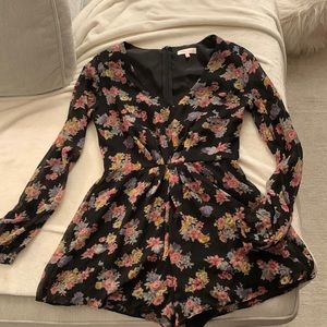 Black floral romper size small